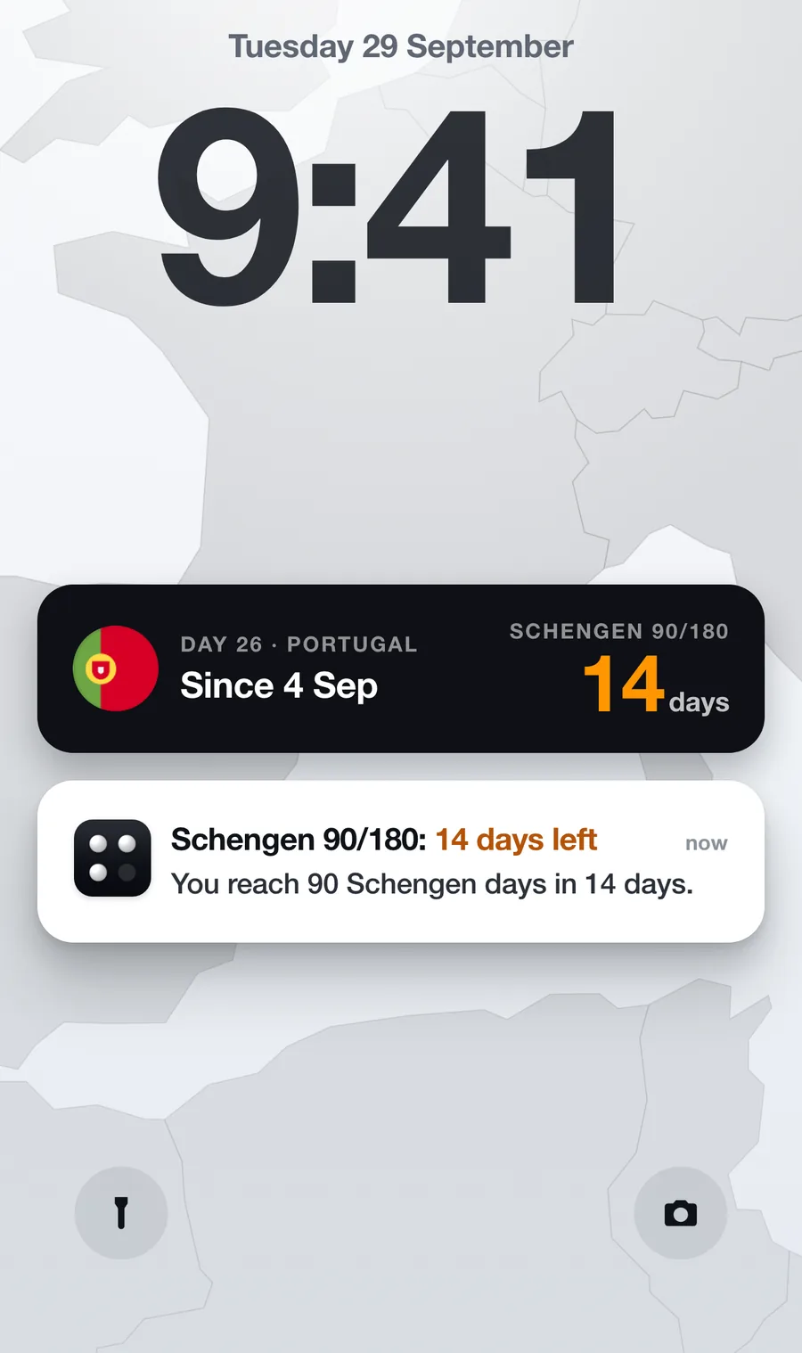 Lock screen with a Quota Live Activity and the alert: Schengen 90/180, 14 days left